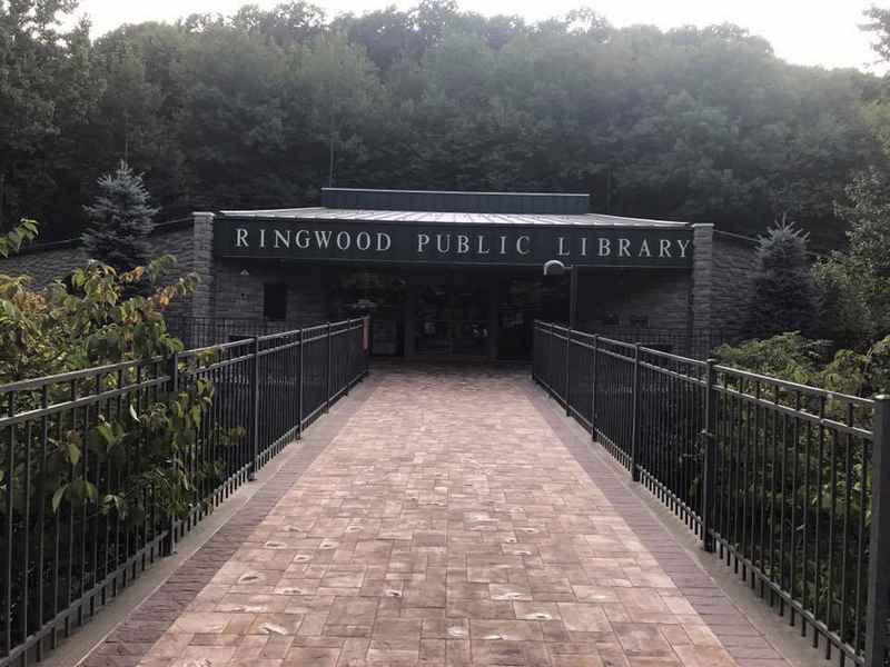 Paver entry walkway and stone facade at the Ringwood Public Library