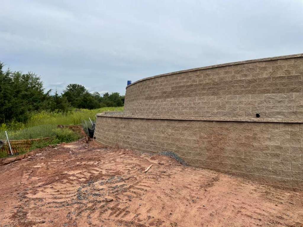 Large curved block retaining wall completed on a commercial site